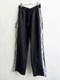 Cross string nylon pants