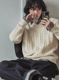 Rich cable V-neck knitwear