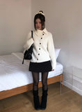 Juke diagonal button high neck knit