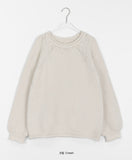 Habibi round neck cable over knit