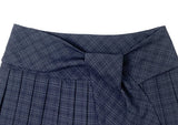 Chete Knot Check Pleats Mini Skirt