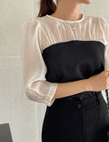 Niaki see-through color matching three quarter length blouse