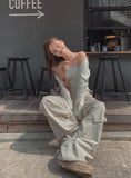 pralen damaged ribbed knit top