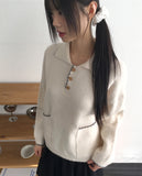 Miden color matching half button pocket collar knit