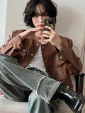 Cape round pocket leather jacket
