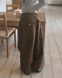 Sando back pocket hem snap pin tuck cotton pants