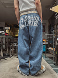 Cartel back painting balloon denim pants