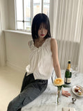 Coffin punched lace string sleeveless blouse