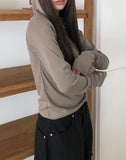 Two-in diagonal button hood T-shirt