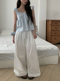 [Scrunchie set] Forming Button Flare Sleeveless Blouse