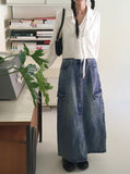 Pluck cut cargo pocket back band slit denim long skirt