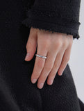 Essence Silver Moissanite Accent Point Ring