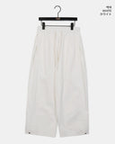 Sando back pocket hem snap pin tuck cotton pants