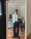 Curden Diagonal Cut Curved Bootcut Pants