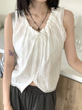 Coffin punched lace string sleeveless blouse