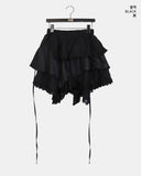 Shuha lace strap diagonal tiered skirt