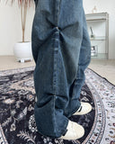 Pad snap button denim pants