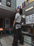 Cartel back painting balloon denim pants