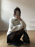 Juke diagonal button high neck knit