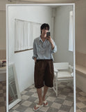 Stool side deep tuck chino pants