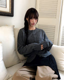 Uran bean button round neck long sleeve cardigan