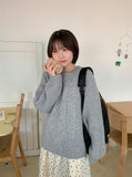 Kouni cable over round knit