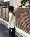 Ui punching ribbon strap round neck see-through long-sleeved knit