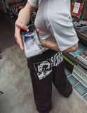 Cartel back painting balloon denim pants