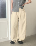 Putting side pin tuck wide cotton pants
