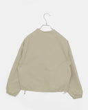 Shuni no-collar snap button string pocket crop overfit jacket
