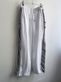 Cross string nylon pants