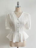 Betty V-neck Embossed Wrinkle Peplum Blouse