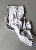 Cross string nylon pants