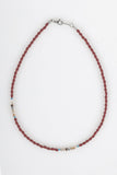 down red gemstone necklace