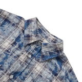 Bribe printed over checkered shirt