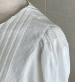 Meringue pintuck shirred blouse