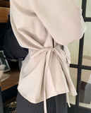 [Muffler set] Ir bean button side strap V-neck long sleeve blouse