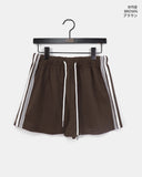 Arch track lace banding shorts short pants