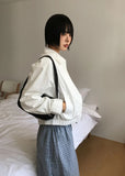 STRAP HIGH NECK BLOUSON