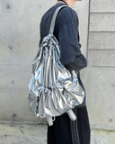 glossy string backpack