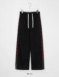 Benday banding side check color matching brushed jogger pants