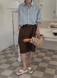 Stool side deep tuck chino pants
