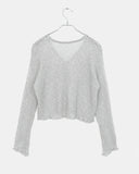 Ate frill punching see-through cardigan