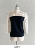 Niaki see-through color matching three quarter length blouse