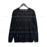 Damage snap see-through knit