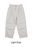 Has wide pin tuck cotton pants