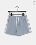 Arch track lace banding shorts short pants