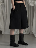 [mnem] pintuck logo bermuda shorts