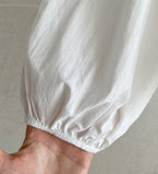Meringue pintuck shirred blouse