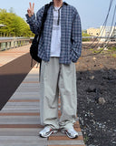 curd over check shirt